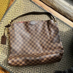 Louis Vuitton graceful PM bag.